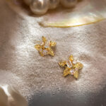 Designer-made earrings featuring 18K gold-plated starfish and zirconia, set in 925 silver. A stylish and luxurious piece with a marine-inspired design  perfect for women. - Image 2