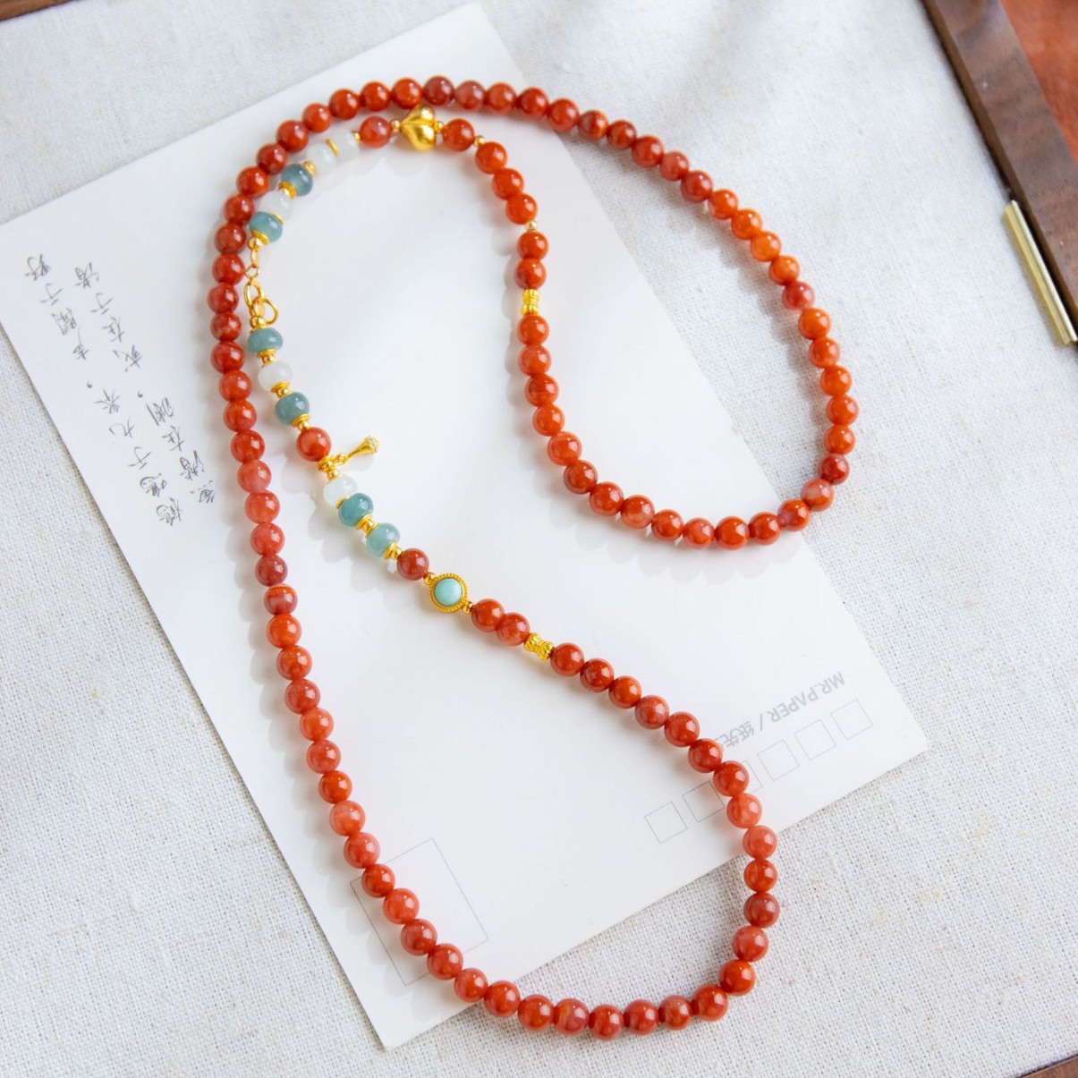 O1CN01Px0ML2222uVKxLTbL_2215976347063-0-cib-1.jpg Natural South Red Peach Hair S925 Silver Plated Sweater Chain, New Chinese Style Necklace, Hetian Jade Clavicle Chain - Image 1